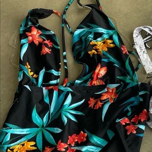 Brand new swim suits in tropical  style